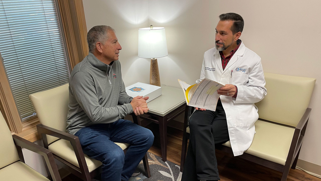 Man speaking to Doctor about Brave Box